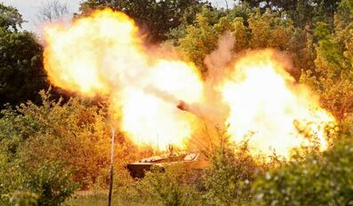A self-propelled howitzer 2S1 Gvozdika of pro-Russian troops fires a leaflet shell
